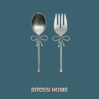 Bitossi Home Fiocco bow salad servers in silver, alternative angle