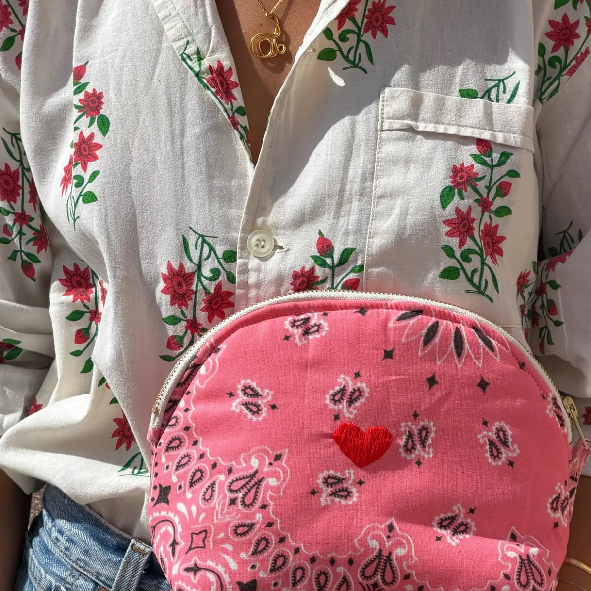 Call It By Your Name Coeur Vanity Large quilted toiletry bag in strawberry and fuchsia, styled in use