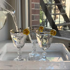 Mario Luca Giusti Dolce Vita Wine Glass, Gold Rim in synthetic crystal, styled in a table setting