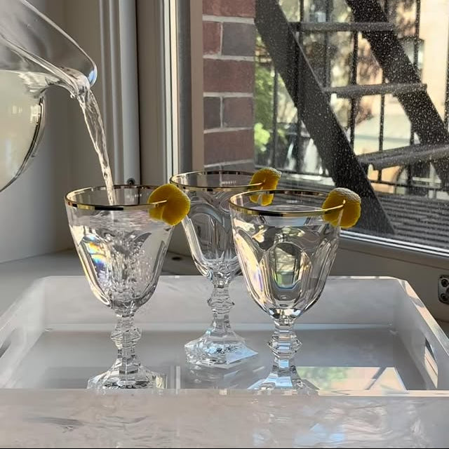 Mario Luca Giusti Dolce Vita Wine Glass, Gold Rim in synthetic crystal, styled in a table setting