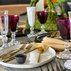 Mario Luca Giusti Dolce Vita Wine Glass, Ruby in synthetic crystal, styled in a table setting