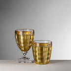 Mario Luca Giusti Winston Wine Glass, Gold in synthetic crystal, styled in a table setting